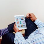 business owner reviews digital advertising analysis