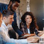 Group of Web Designers at Computer